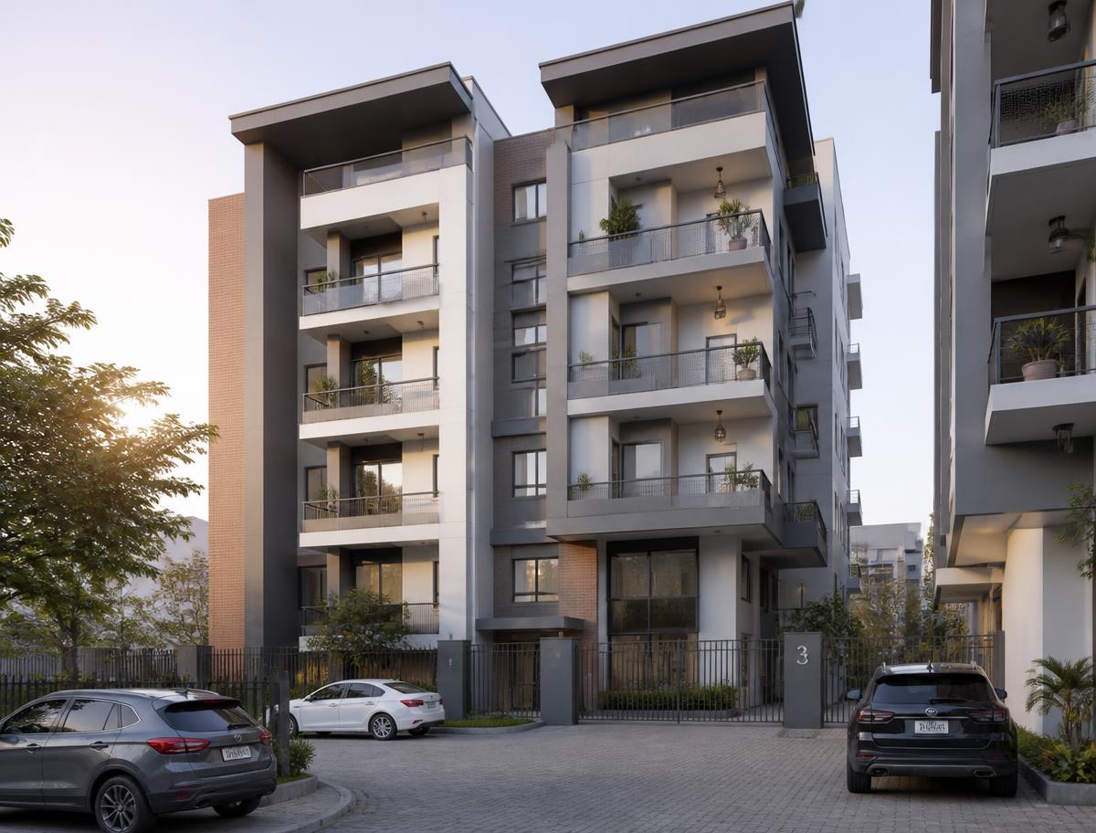 Modern mid-rise apartment block with balconies and a paved courtyard